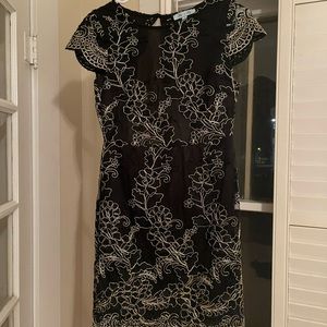 Black backless dress with gold details